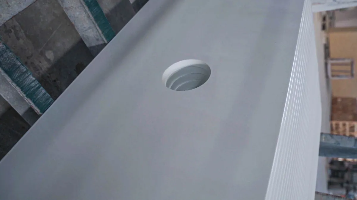 White top with a drilled hole, close up